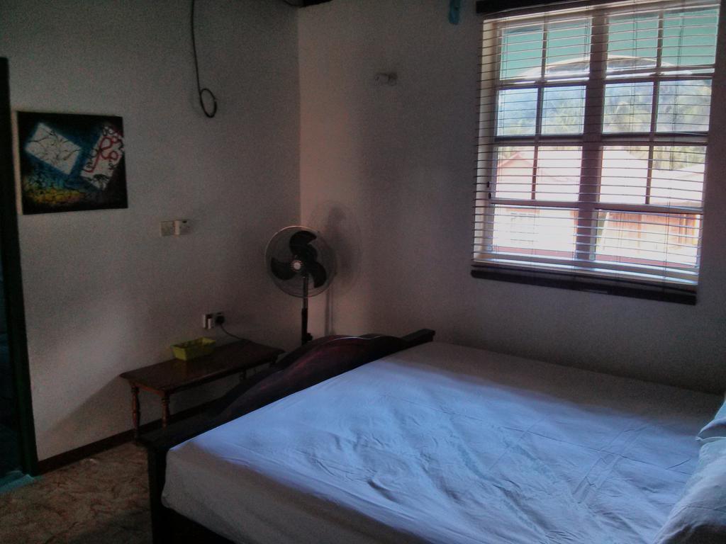 Mainroad Suite Calibishie Buitenkant foto