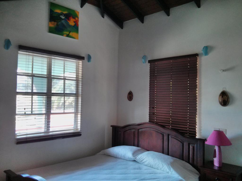 Mainroad Suite Calibishie Buitenkant foto