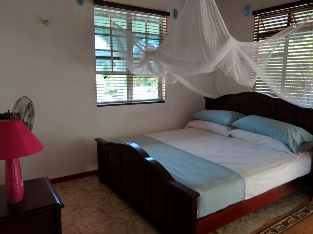 Mainroad Suite Calibishie Buitenkant foto