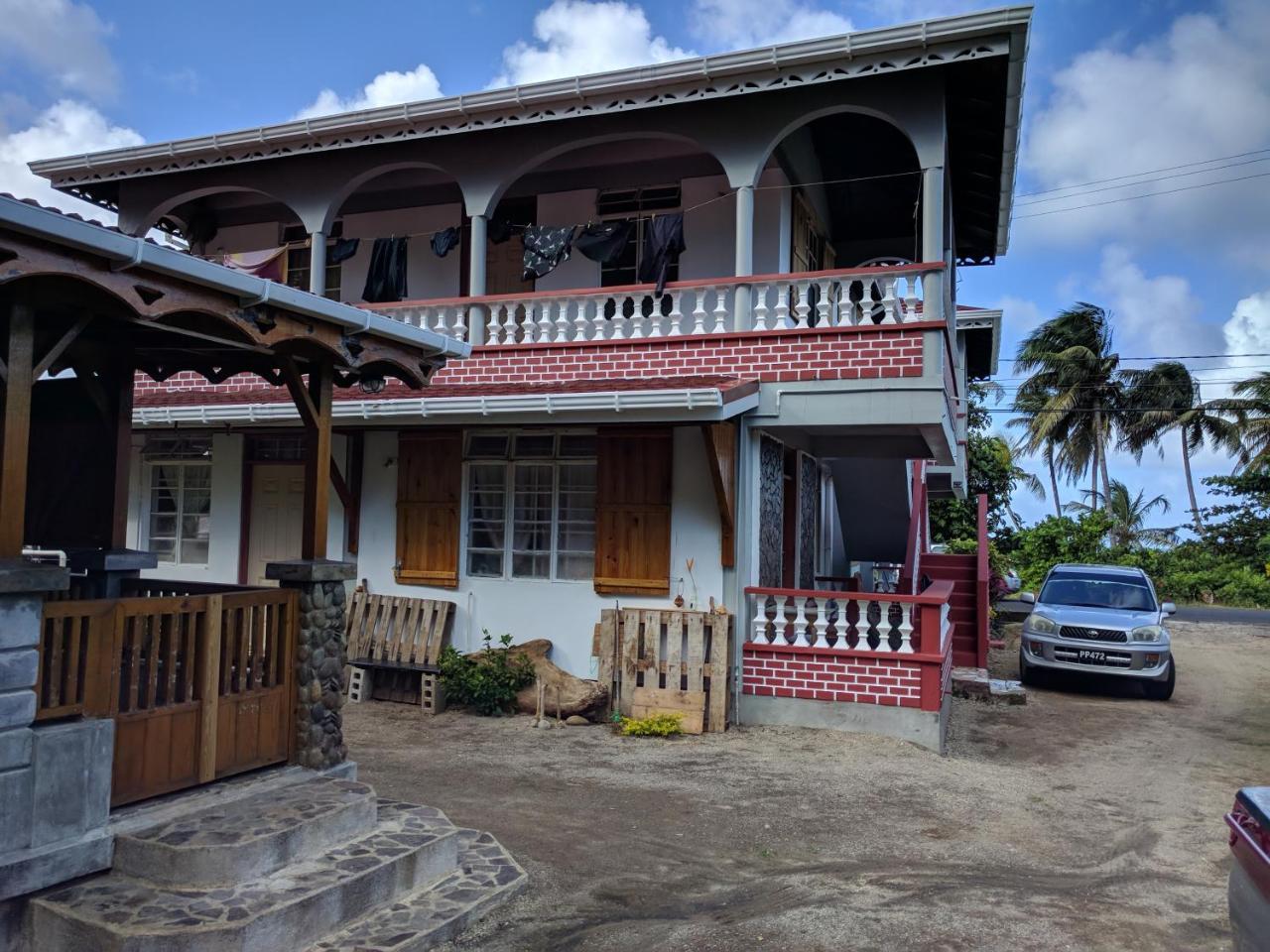 Mainroad Suite Calibishie Buitenkant foto
